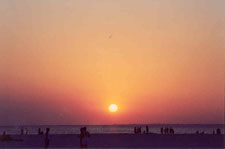 sun going down on fmb beach
